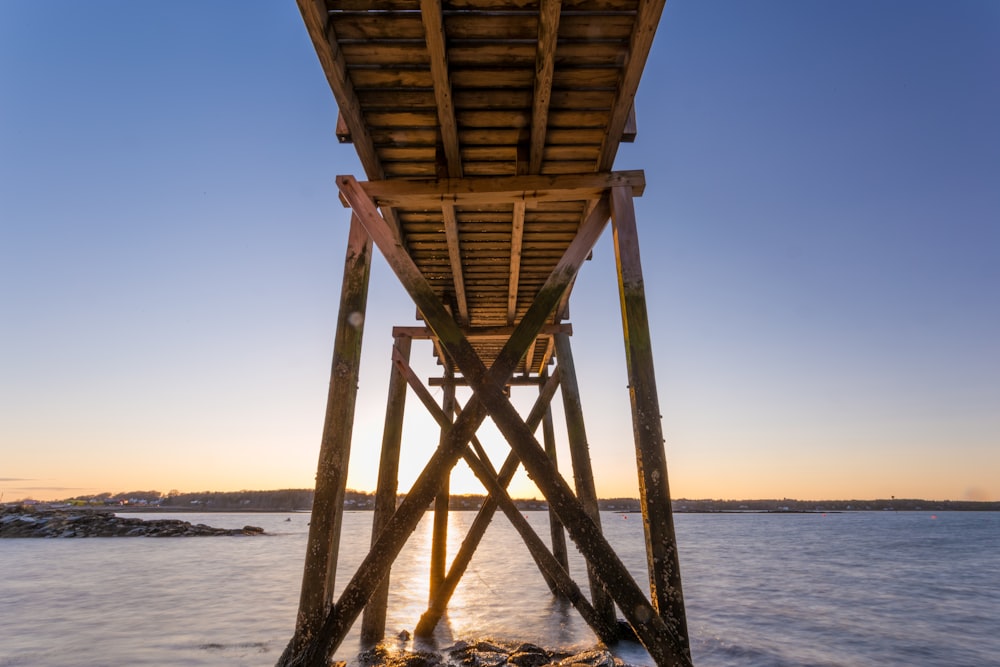 brown wooden dock in low angle shot