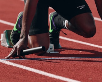 man on running field