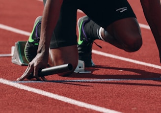 man on running field