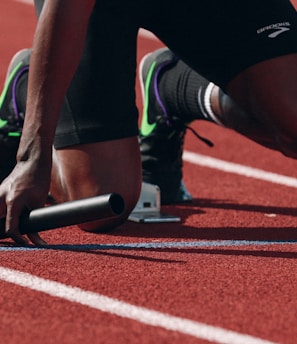 man on running field