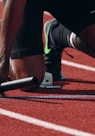 man on running field