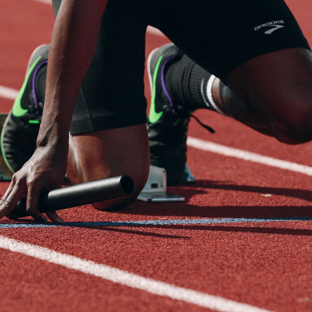 man on running field