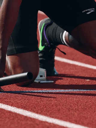 man on running field