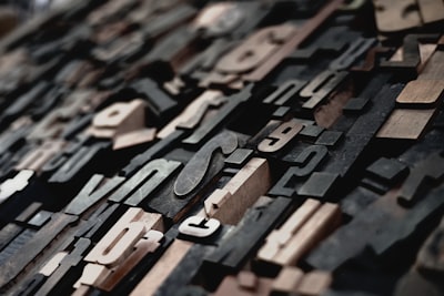 closeup photo of cutout decors typography teams background