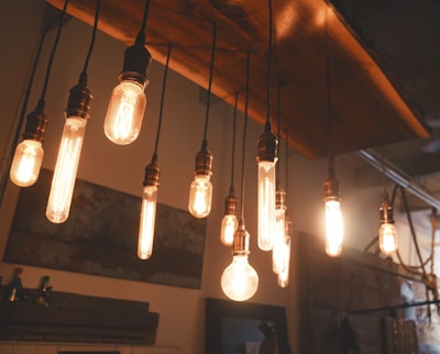 photo of edison light bulbs hang on ceiling