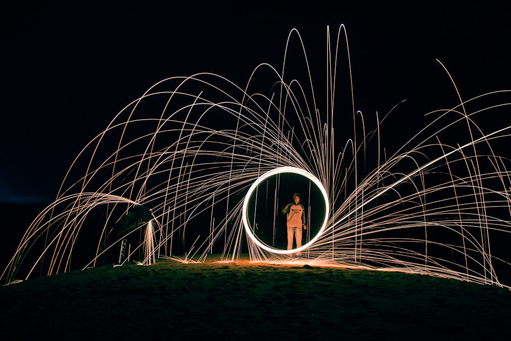 foto time lapse di persona a riva