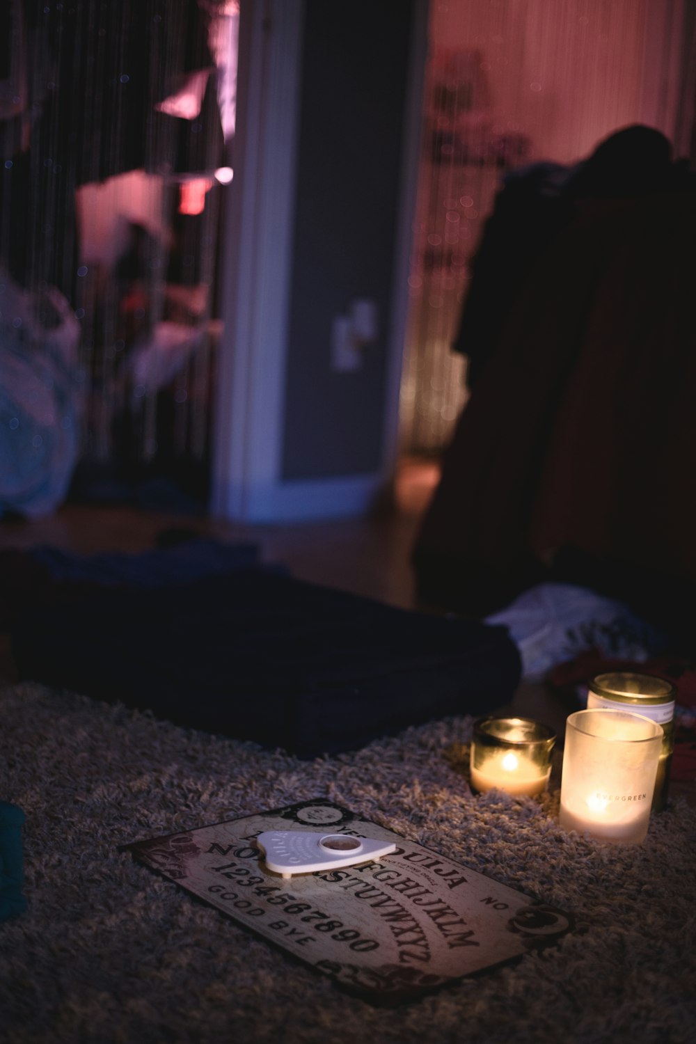 white candle on brown table