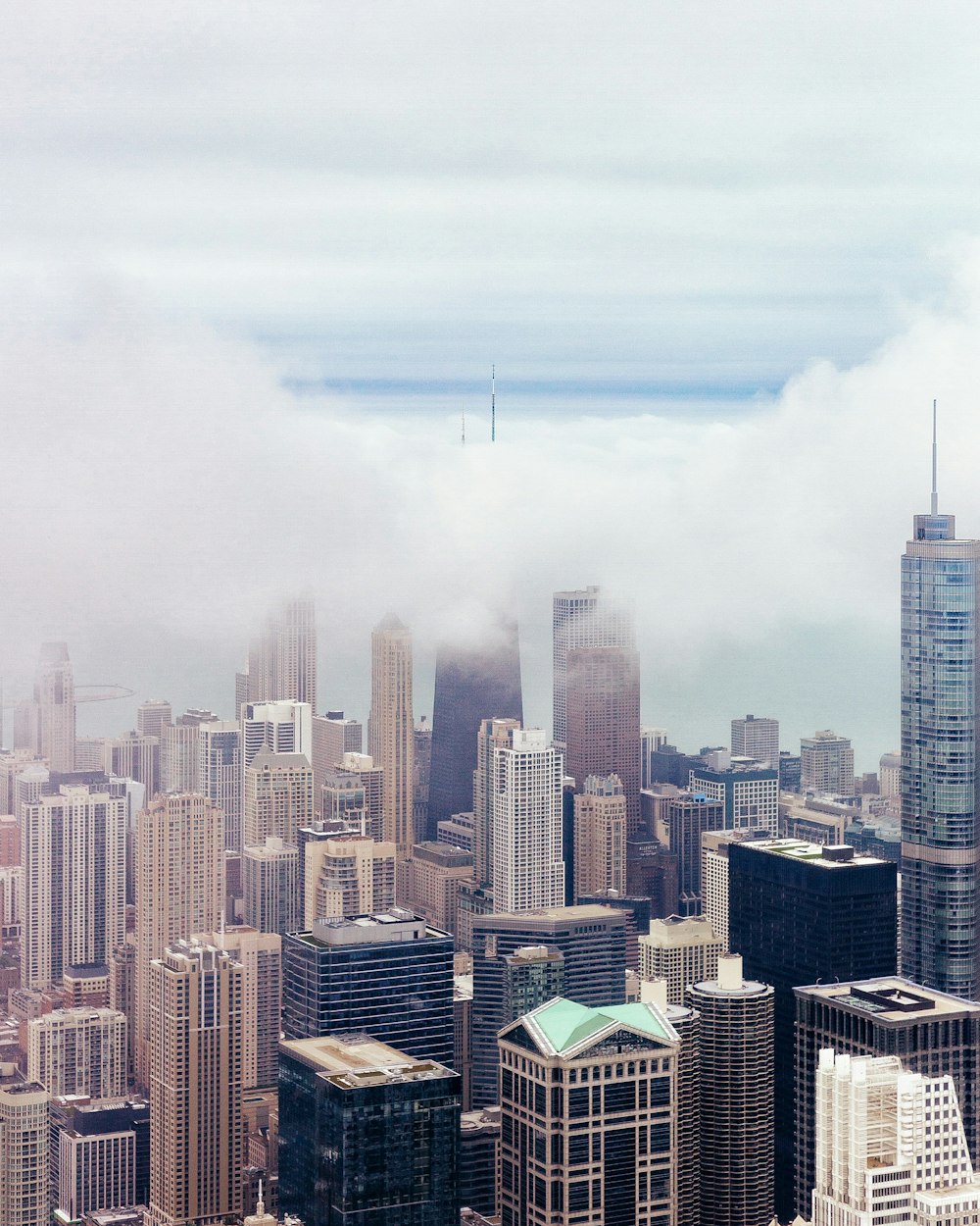 skyscrapers under cloudy sky