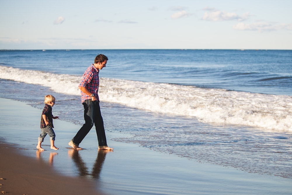 person standing on seashore