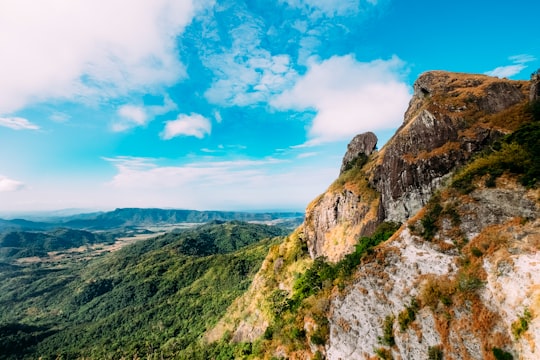 mountain distance with green mountains during daytime in Mount Pico De Loro Philippines