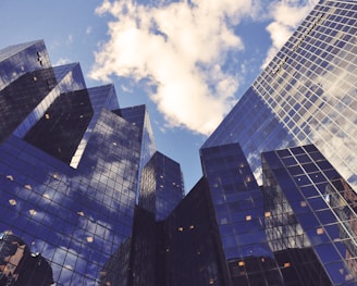 low angle photo of curtain wall building