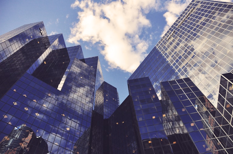 low angle photo of curtain wall building