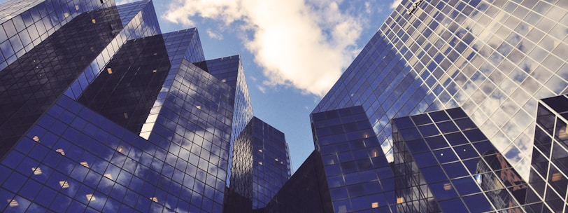 low angle photo of curtain wall building