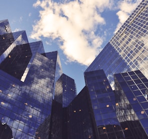 low angle photo of curtain wall building