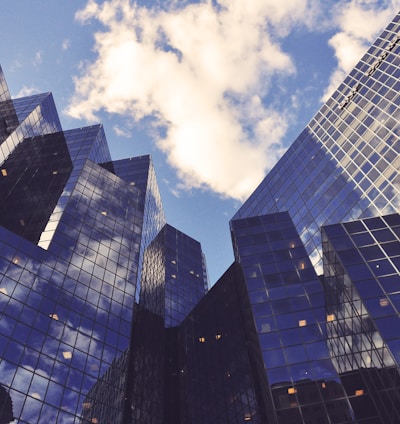 low angle photo of curtain wall building