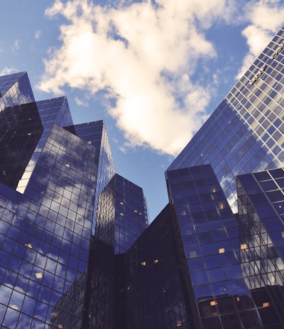 low angle photo of curtain wall building