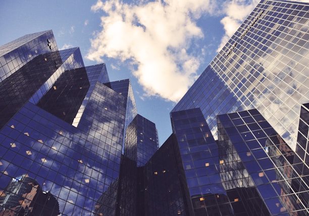 low angle photo of curtain wall building