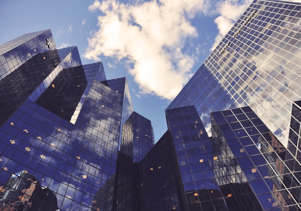 low angle photo of curtain wall building