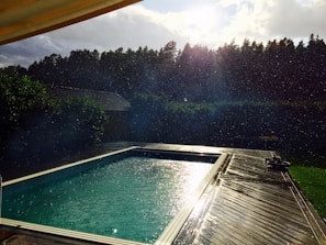 Pool deck gleaming under the California sun after a thorough power wash.