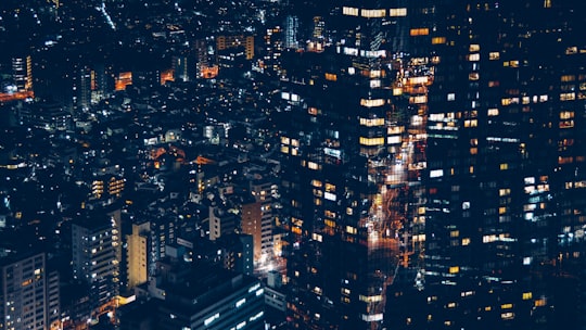 aerial photography of city buildings during nighttime in Roppongi Hills Japan