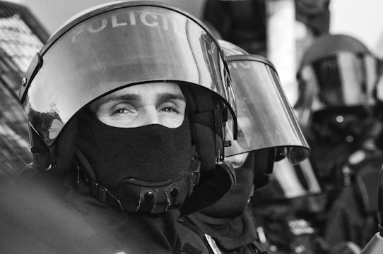 Photo of various personal protective equipment like helmets, gloves, and safety glasses.