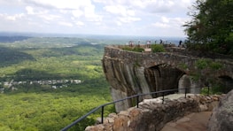 Hikers enjoying a scenic overlook with sweeping views of the Arcadia Valley landscape.