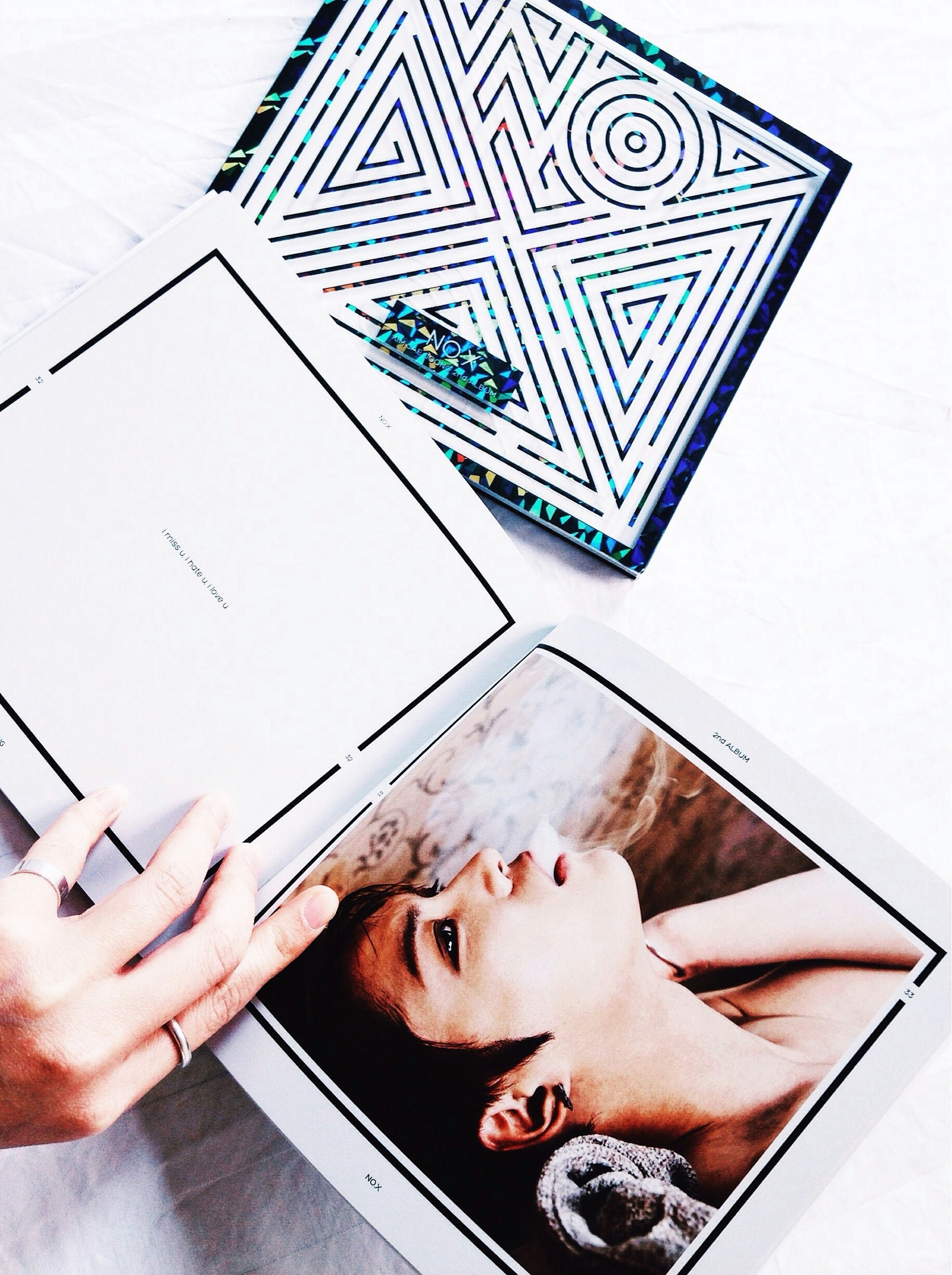 A delighted client holding their custom-made book, surrounded by vibrant pages that bring their imagination to life.