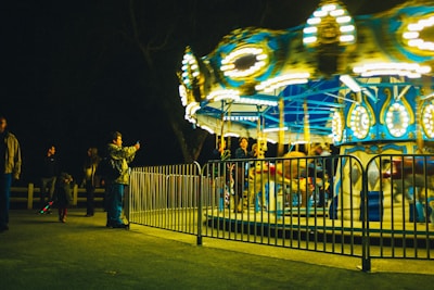 Photo booth 360 in action with guests spinning and smiling.