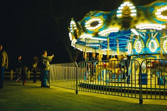 The uniquely 360 photobooth glowing softly in the evening, inviting guests to create memorable spins.