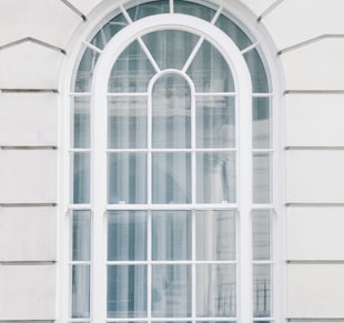 glass window with white steel frame