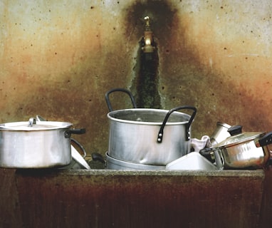 kitchen utensils on stone washing station