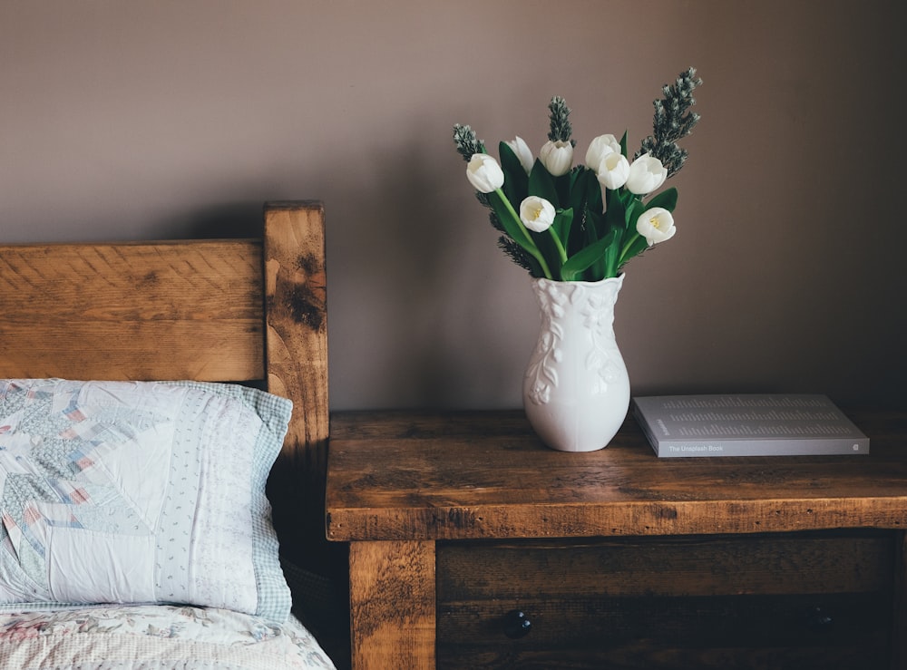 white flower vase on surface