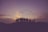 silhouette of people standing on hill