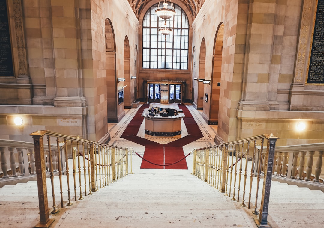red carpet surrounds the reception desk, Elegant entrance hall