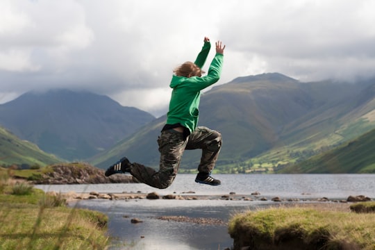 person jumping cliff in Scafell Pike United Kingdom