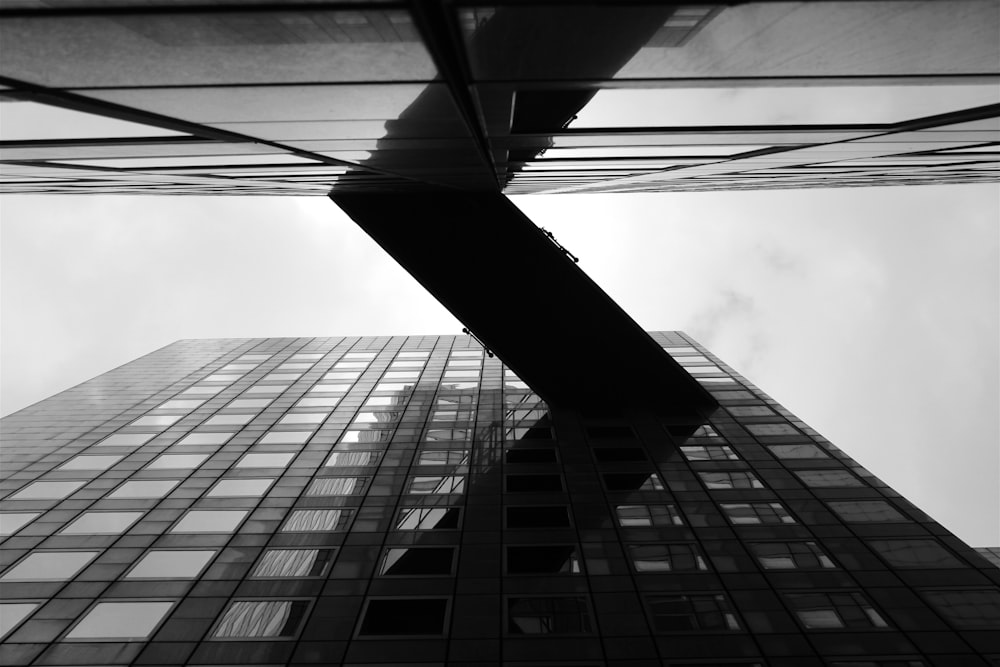 grayscale photo of worm's eye view of building