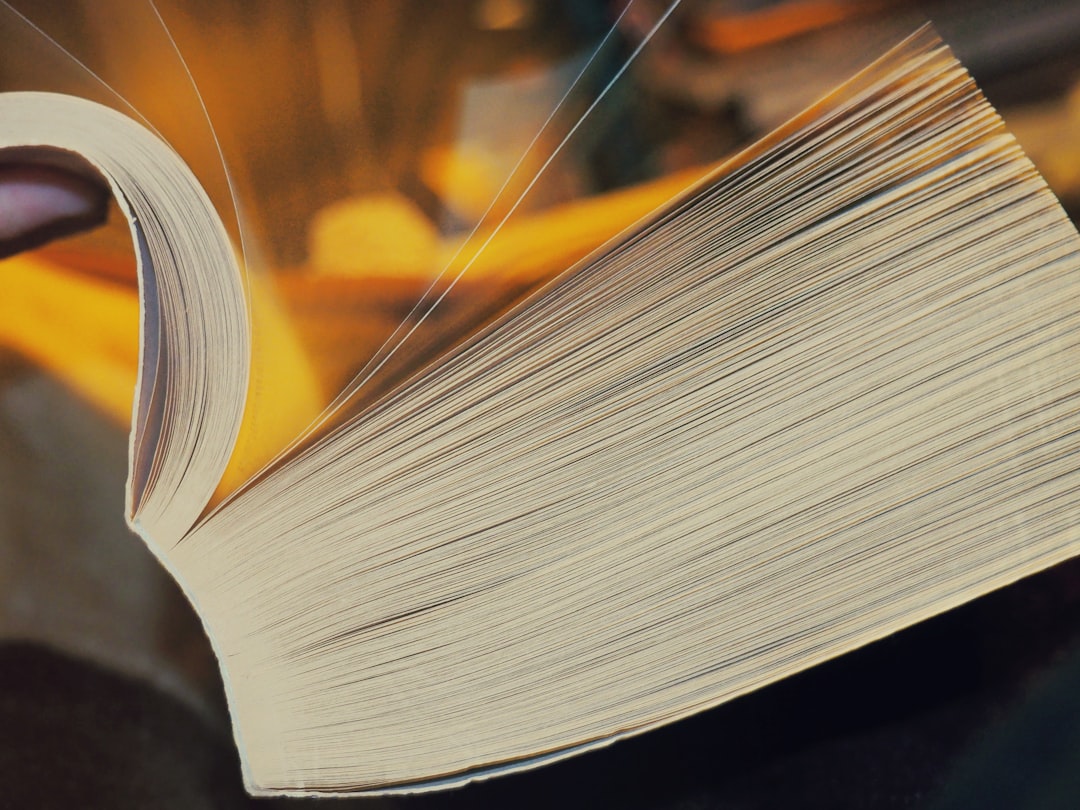 closed-up photo of white open book,