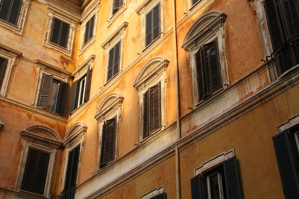 low angle photography of white building