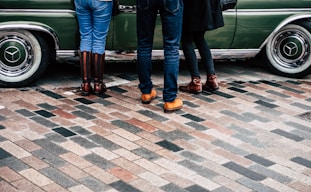group of people standing on tiled surface