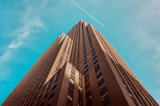 worm's eye view of brown building in Rockefeller Center United States