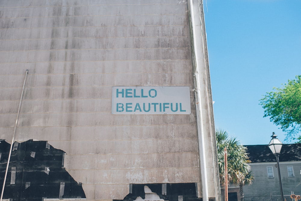 Hello Beautiful-printed brown concrete wall with near white wooden house