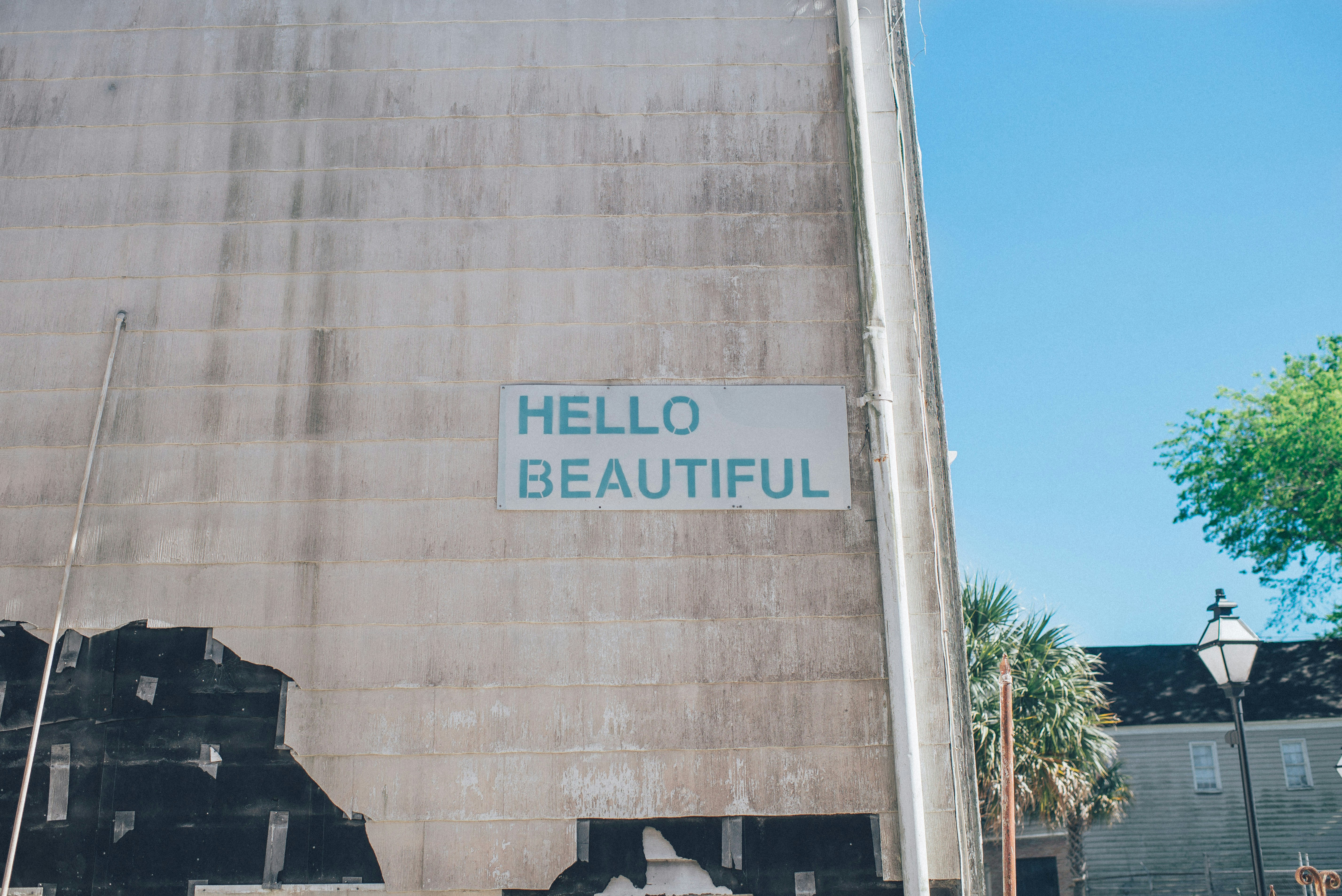 “Hello beautiful” sign on building