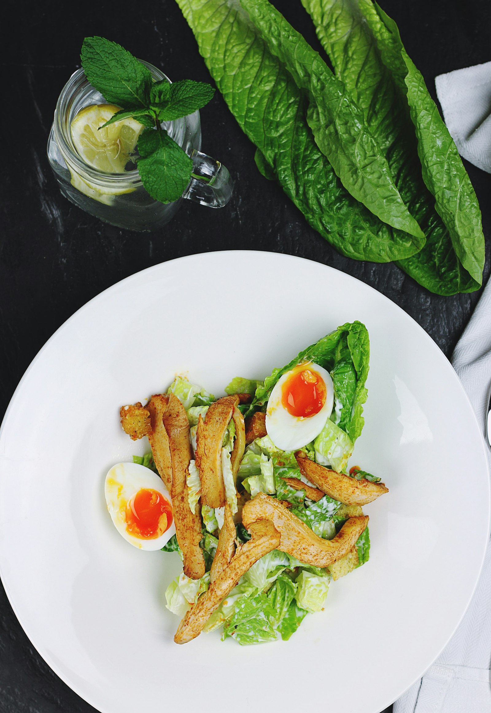 Canon EOS 7D + Canon EF 50mm F1.8 II sample photo. Cooked egg with lettuce photography