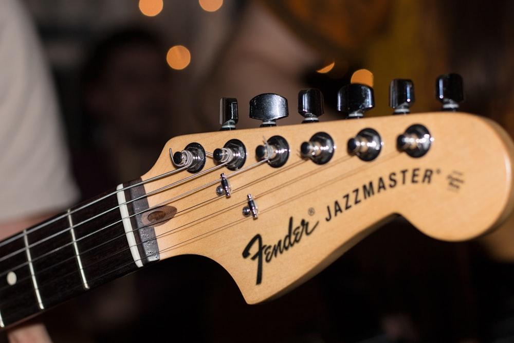 photo of brown Fender Jazzmaster guitar headstock