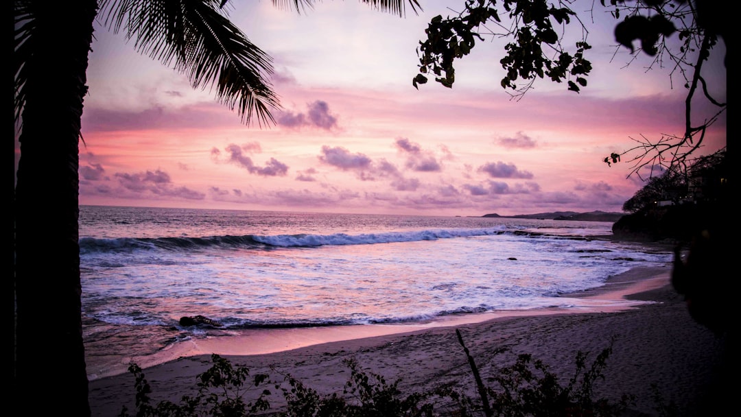 waves crashing through shore,