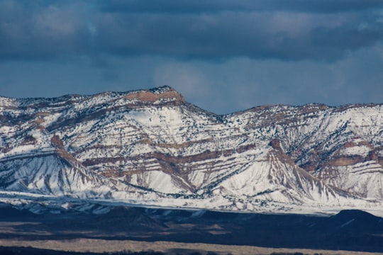 mountain covered with snow during daytime in Fruita United States