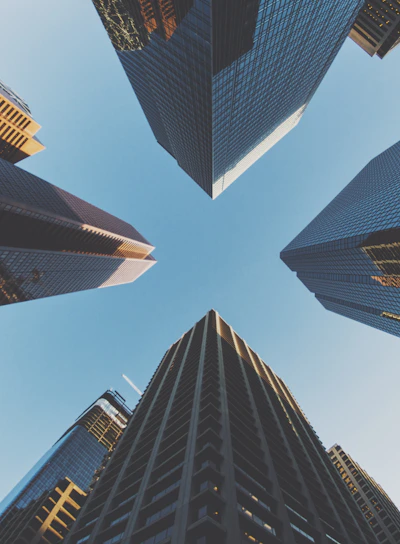 blue and black city buildings photography