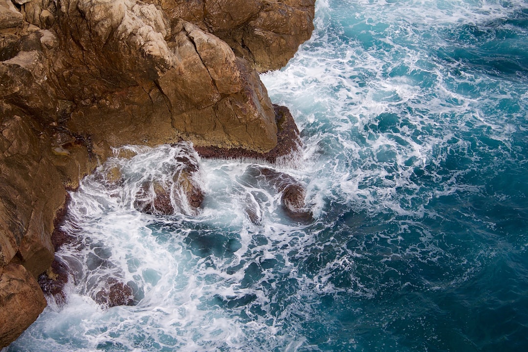 photo of Dubrovnik Cliff near Muralles de Dubrovnik