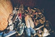 photography of assorted-color shoes lot on box