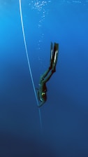woman diving underwater